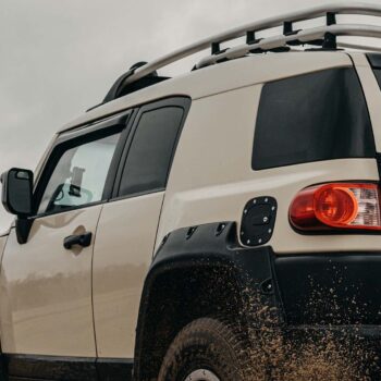 Crossover car in mud driving