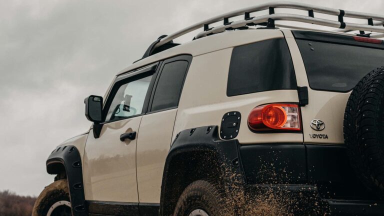 Crossover car in mud driving