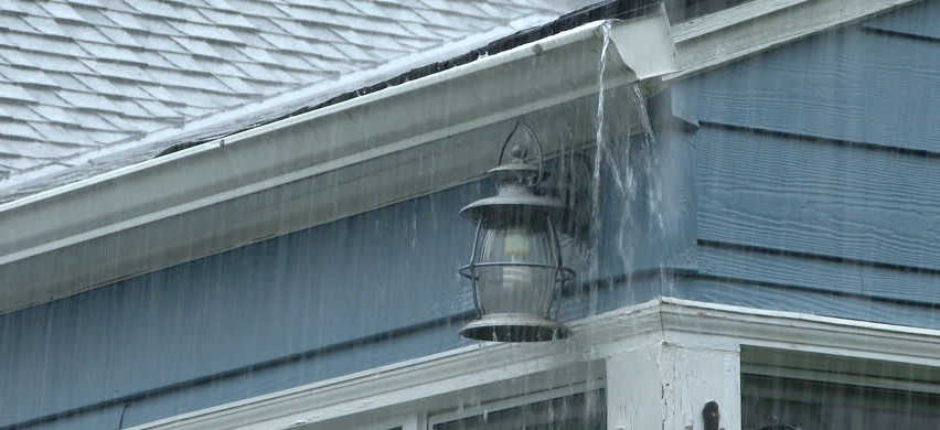 Damaged roof in rain