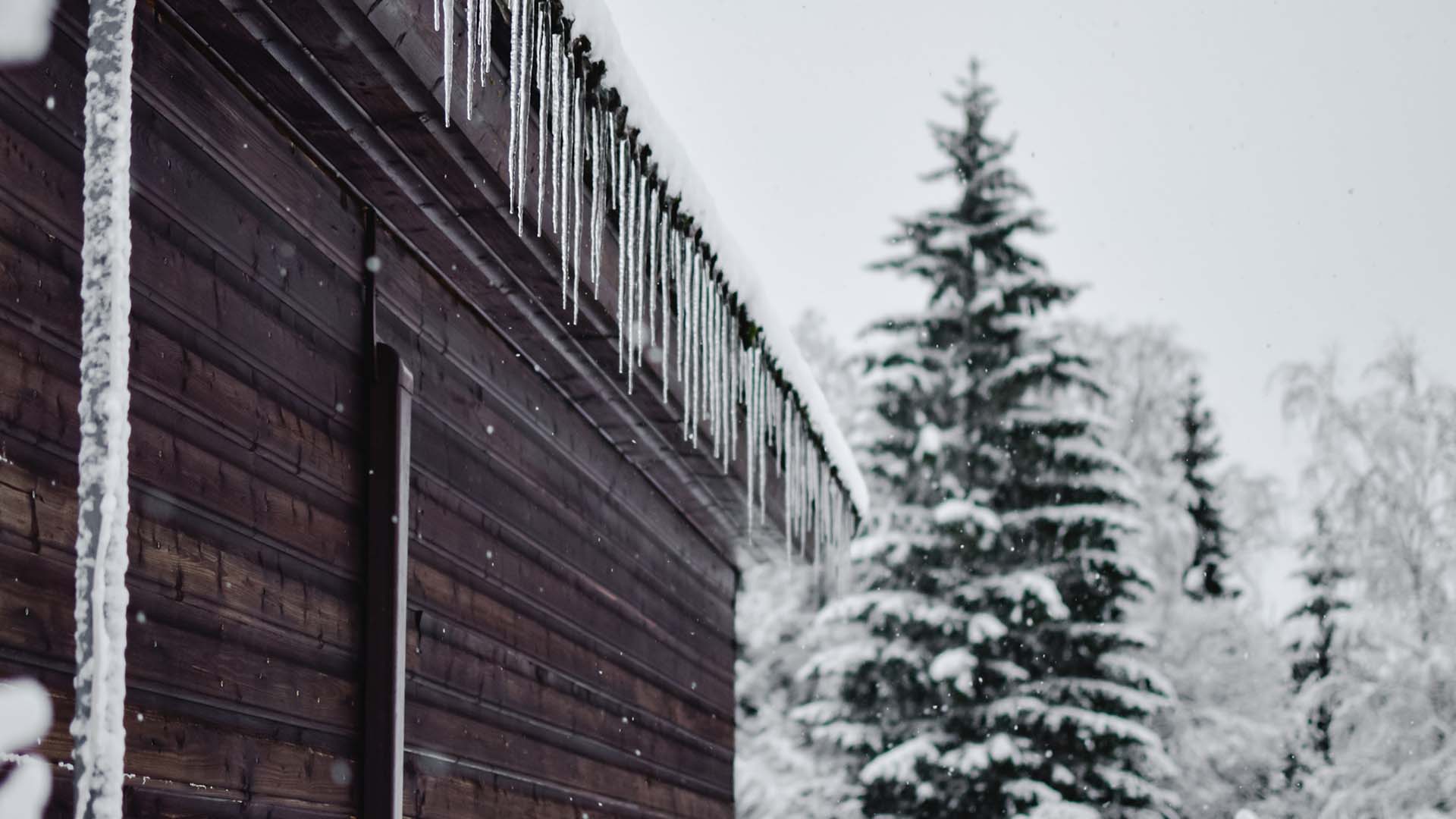 Brown Wooden Fence Covered With Snow