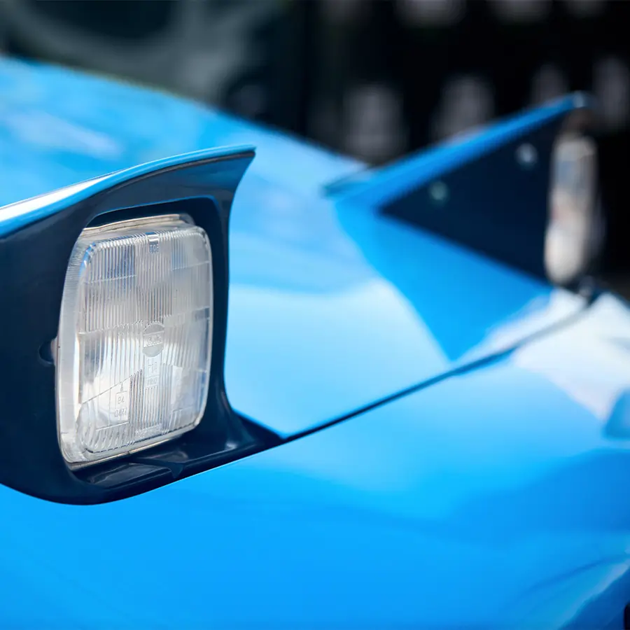 Close up of headlights on a right-hand drive car.