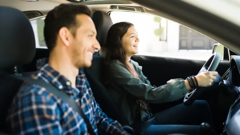 Teen driving with their parent.